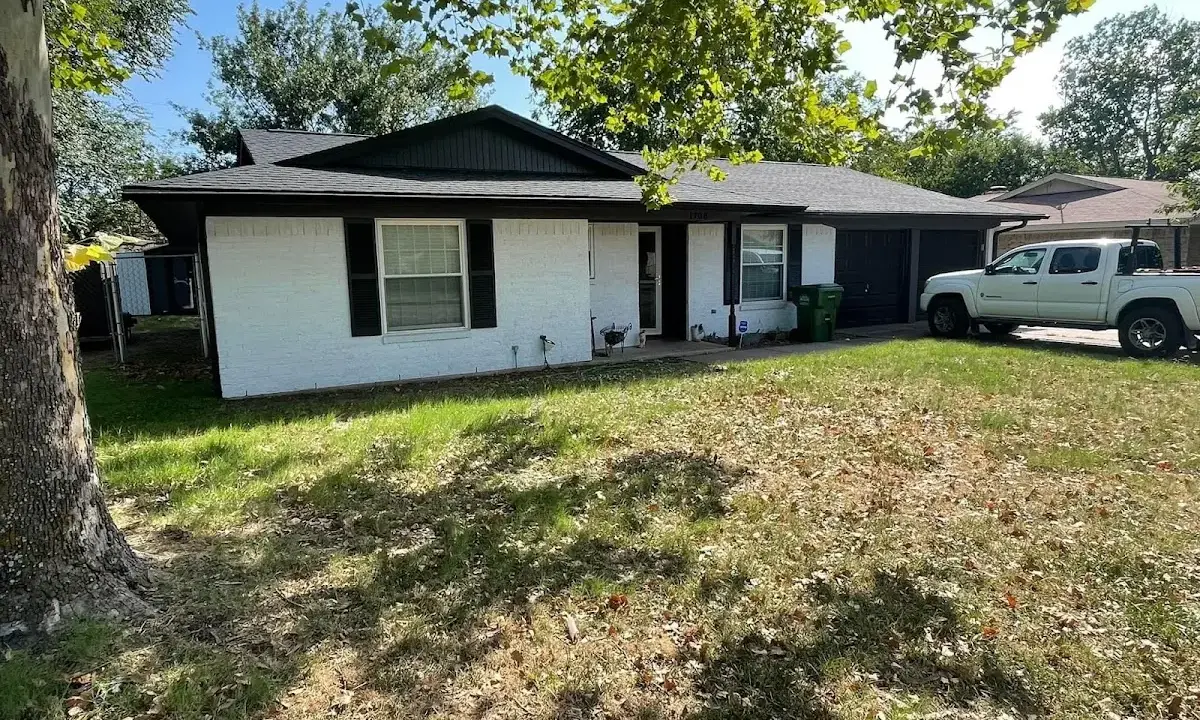Professional roofing crew working on a residential roof in Chicago